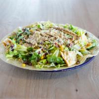 Caesar Salad with Chicken · Charbroiled chicken breast, romaine lettuce, red onions, garlic tortilla chips, black bean-c...