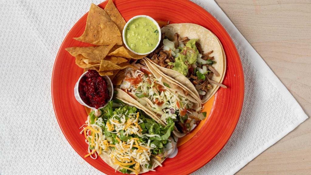 Tres Taco Basket Plate · 3 Tacos. Choice of chicken, crispy beef or crispy chicken.