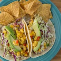 California Fish Taco Plate · 2 tacos. Marinated char-broiled fish served on a warm flour tortilla with dawg sauce, cilant...