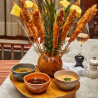 6 Piece Dancing Shrimp  · Coconut Battered Colossal Shrimp!  With pineapple sauce, ponzu sauce, spicy mayo