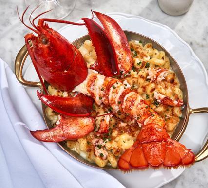 Lobster Mac N Cheese · Aged cheddar, gruyère, cavatappi pasta. 