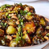 Cashew Brussels Sprouts · Thai peanut sauce.