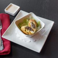 Korean Steak Bulgogi Wraps · Deep-fried roll filled with sliced steak, cream cheese and shredded cheese.