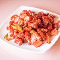 53. Sweet and Sour Pork · Deep-fried pork, bell pepper, onion, pineapple and carrot in sweet and sour sauce.