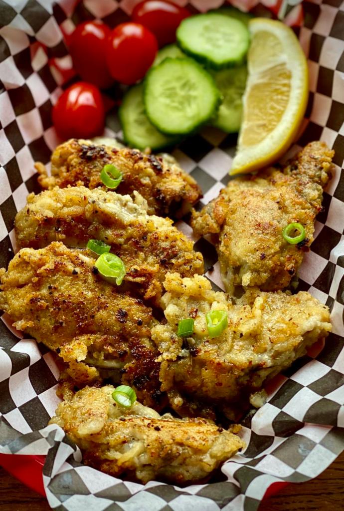 Pan Fried Oysters  · 6 pieces. Lightly breaded and seasoned in house and cooked in olive oil and butter with garlic. 
