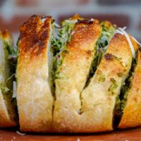 Sourdough Round Bread · San Francisco sourdough round with fresh garlic butter.