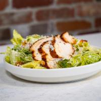 Roasted Chicken Caesar Salad · Fresh cut romaine, roasted chicken, sourdough croutons, Parmesan cheese, and zesty Caesar dr...