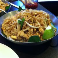 29. Pad Thai  · Stir-fried Thai noodles with baby shrimp, egg, bean sprouts, dry tofu and topped with ground...
