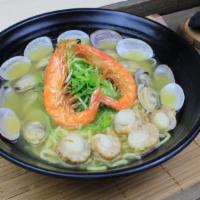 R9. Seafood Shio · Chicken broth with scallops, baby clams, soft shelled shrimp, curly noodle and green onion.
