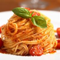 Spaghetti with Tomato Sauce and Basil · Tomato sauce and basil.