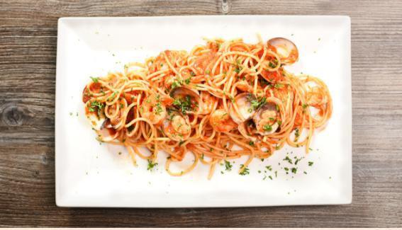 Spaghetti Seafood “ADP” Style · Calamari, squid, salmon, clams, mussels and shrimps.