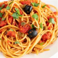 Spaghetti alla Siciliana · Eggplant, Parmigiano cheese, and tomato sauce.