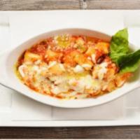 Gnocchi Sorrentina · Oven melted mozzarella cheese, basil, tomato sauce.