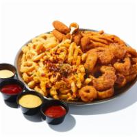 Fried Combo · Assorted fried appetizers: French fries, sweet potato fries, mozzarella sticks, onion rings ...