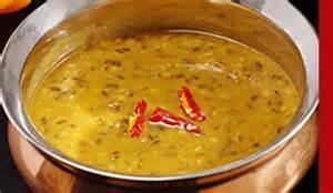 Dal Fry · Yellow lentils boiled with garlic, ginger and cooked with onion, tomato and lots of herbal s...