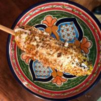 Veg Elotes  · Boiled and then grilled corn with almond based cream and cheese,  and powdered Chile-