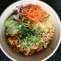 Nutty Poke · Spicy tofu and peanut, sesame ginger dressing over rice with house pickles, radish, and spro...