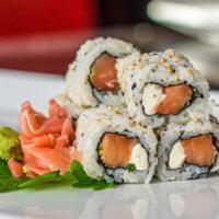 The Philly Maki-Roll · An inside-out roll with smoked salmon, cream cheese and scallions.

