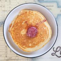 Village Pancakes · An homage to our roots in the west village these pancakes can’t be beat. Three fluffy, golde...
