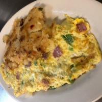 1. Western Omelet · Diced onions, peppers and ham.