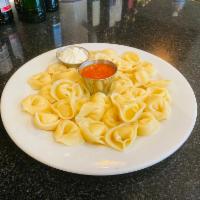 Tortellini Plate.  Vegetarian, Gluten Free · Cheese Tortellini made from Gluten Free flour, served with sour cream & home-made tomato sauce
