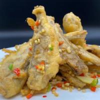 Salt & Pepper Yellow Croaker 椒鹽黃花魚 · Stir-fried crab with mix salt, white pepper, sugar, and five spice pepper.