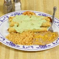 Flauta Plate · 3 rolled tacos, desebrada or chicken with guacamole. Served with, beans and rice.