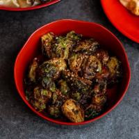 Crispy Fried Brussels Sprouts · Deep-fried brussels sprouts glazed with sweet chili garlic sauce.