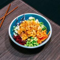 Soy-Mate Tofu Bowl · Rice topped with sesame seeds, lettuce, edamame, cucumber, avocado, carrots, cabbage, beets,...