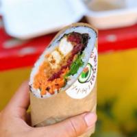 Uncle Iroh Burrito Roll · Crispy tofu, spring mix, carrots, beets, ginger miso dressing, sweet chili peanut, and fried...