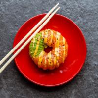 Salmon Avocado Donut · seasoned rice, fresh salmon, avocado, eel sauce, spicy mayo sauce, furikake, sesame seeds,