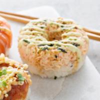 Crabmeat Donut · Crabmeat donut with eel sauce, spicy mayonnaise, and wasabi mayonnaise. Topped with wasabi f...
