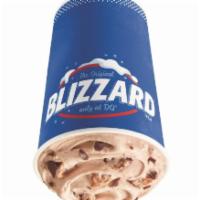 Snickers Blizzard Treat · Snickers® pieces and chocolatey topping blended with cream DQ® vanilla soft serve blended to...