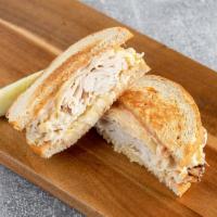 #1. Half Turkey Reuben Sandwich · Turkey breast and Swiss cheese grilled with kraut and Russian dressing on seedless rye.