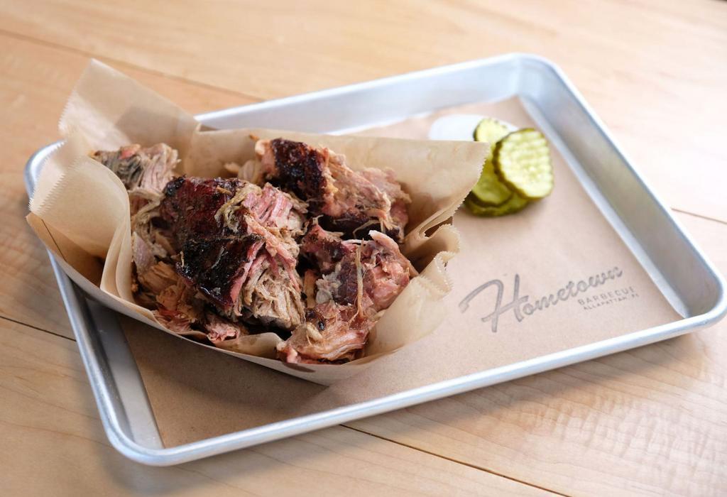 Pulled Pork · Pulled pork smoked over white oak, served with hog sauce.
