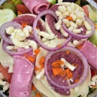 Antipasto Salad · house salad with ham, salami, provolone cheese on top and Italian vinaigrette dressing on th...