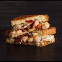 Aphrodite Sandwich · 15 Must Try Sandwich by Zagat.
Shrimp and Bacon Grilled Cheese. Served with Side of Shrimp C...