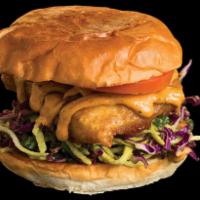 Encantado Sandwich · Battered Cod, Housemade Chipotle Aioli & Jicama Slaw on a Toasted Brioche Bun. Served with a...