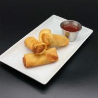 Spring Rolls  · Fried vegetable spring rolls with a side of sweet and sour sauce.
