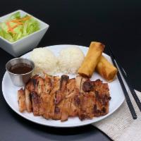 Chicken & Spring Rolls · Grilled marinated chicken thigh, rice, and 2 pieces of vegetable spring rolls.
