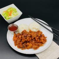 Sweet & Sour Chicken · Battered pieces of chicken deep-fried and stirred with sweet and sour sauce.