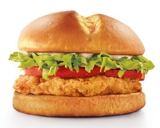 Classic Crispy Chicken Sandwich · Crispy chicken with mayonnaise, lettuce, and tomato on a brioche bun.