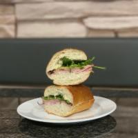 Frenchman Sandwich · Black Forest ham, melted Swiss, mixed greens and Dijon mustard; toasted on a french roll 