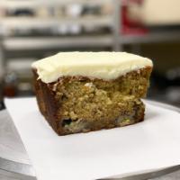 Banana Bread  · our house-made banana loaf topped with cream cheese frosting