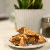 Apple Turnover · puff pastry dough filled with cinnamon apples, topped with house-made glaze