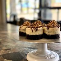 Chocolate Peanut Butter Cheesecake · our house-made cheesecake swirled with rich chocolate ganache and peanut butter; sitting on ...