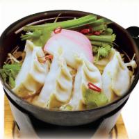 Dumpling Hot Pot · Pork Dumpling, Tofu, Mushrooms, Scallions and Fish Cake