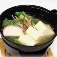 Tofu Hot Pot · Silky Tofu, Mushrooms, Scallions and Fish Cake