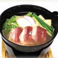Duck Hot Pot · Sliced Duck Meat, Tofu, Scallions and Fish Cake