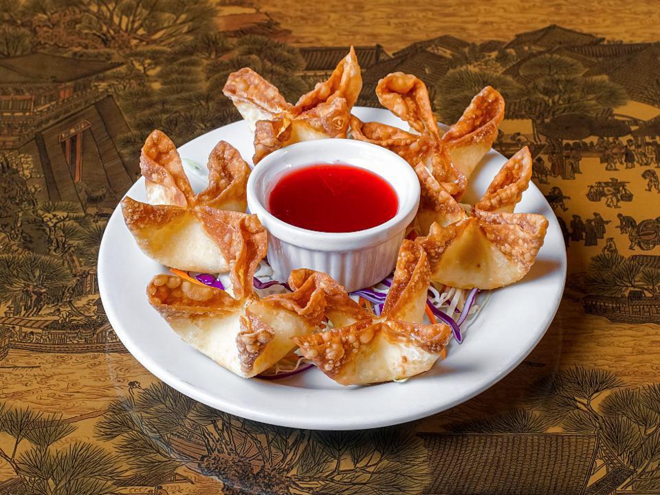 Cheese Wonton (6) · Deep fried cream cheese wrapped in wonton skins. Served with sweet and sour sauce.